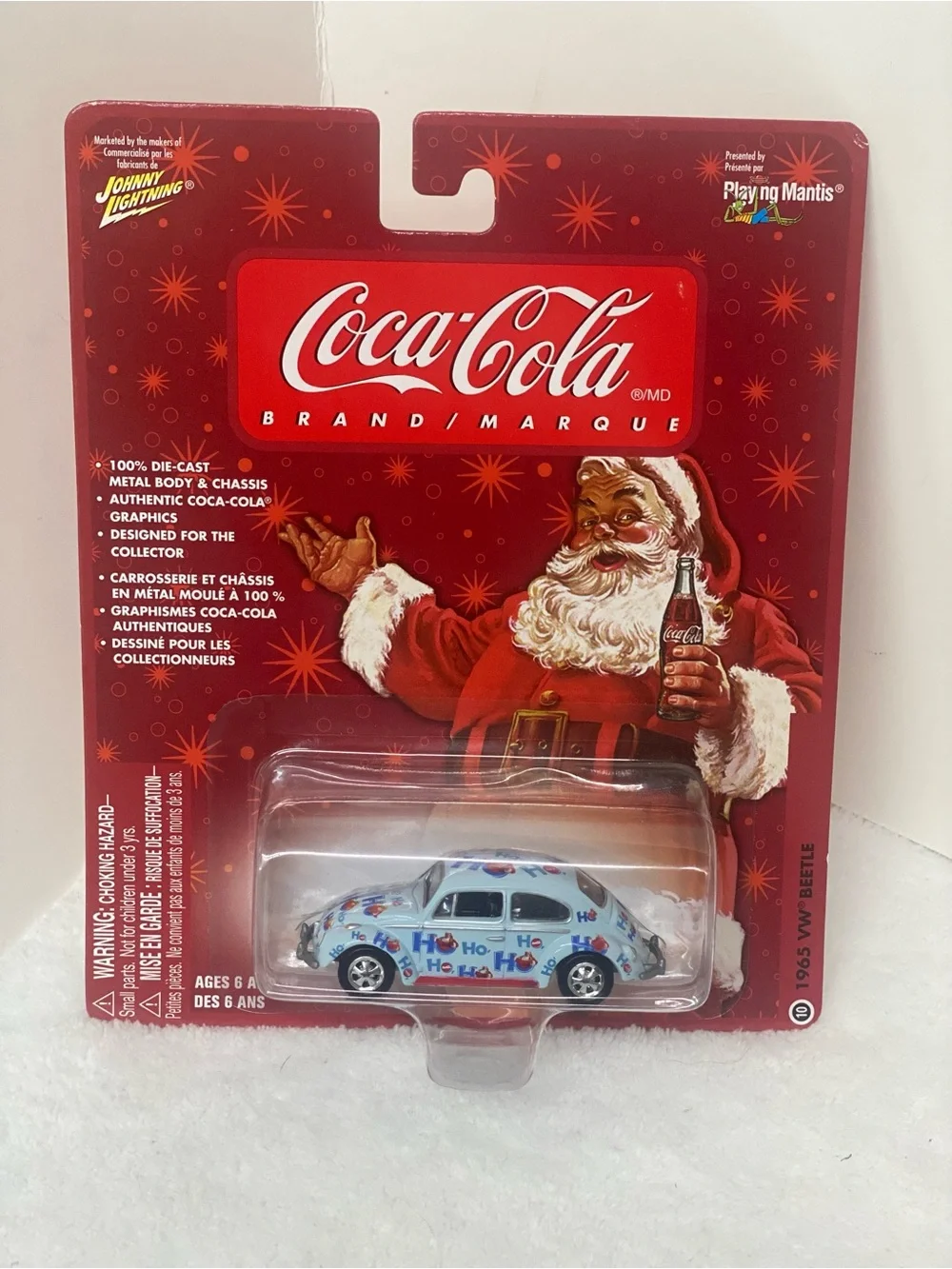 Johnny Lightning Die Cast 1965 Volkswagen Beetle Coca Cola Brand Ho Ho Ho on Car
